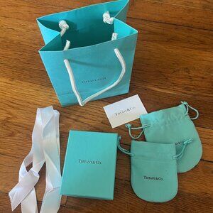 TIFFANY'S bag, box, and two drawstring bags